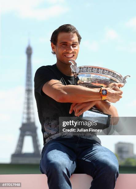 Rafael Nadal of Spain poses during a photocall to celebrate his record breaking 10th French Open title at Quai de Grenelle on June 12, 2017 in Paris,...