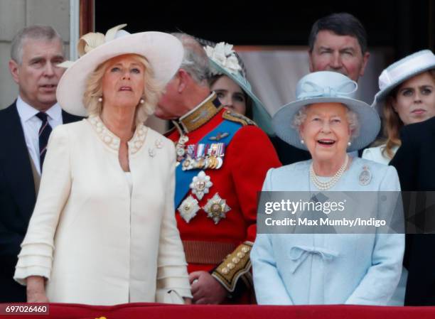 Camilla, Duchess of Cornwall and Queen Elizabeth II watch the flypast from the balcony of Buckingham Palace during the annual Trooping the Colour...