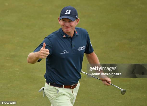 Brandt Snedeker of the United States reacts after making a birdie on the 15th green during the third round of the 2017 U.S. Open at Erin Hills on...