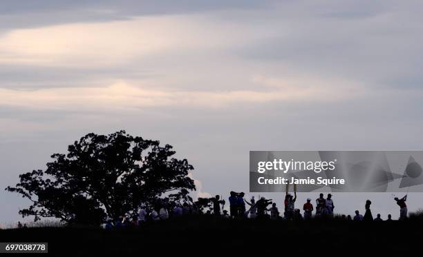 Paul Casey of England plays his shot from the 13th tee during the third round of the 2017 U.S. Open at Erin Hills on June 17, 2017 in Hartford,...