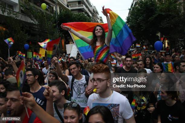 People carry placards, flags and balloons during the 6th annual Gay Pride march in Thessaloniki, northern Greece, on June 17, 2017.