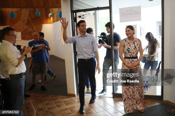 Democratic candidate Jon Ossoff and his girlfriend, Alisha Kramer, arrive at his Sandy Springs Field Office to thank volunteers as he runs for...