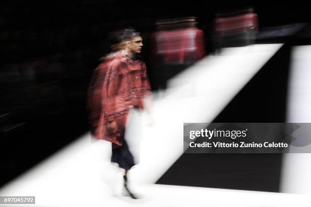 Models walk the runway at the Emporio Armani fashion show during Milan Men's Fashion Week Spring/Summer 2018on June 17, 2017 in Milan, Italy.