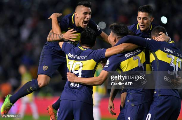 Boca Juniors' defender Jonathan Silva celebrates with teammates after scoring the team's fourth goal against Aldosivi, at Jose Maria Minella stadium...