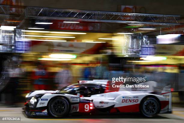 The Toyota Gazoo Racing TS050 of Yuji Kunimoto, Nicolas Lapierre and Jose Maria Lopez returns to the garage for a pit stop during the Le Mans 24 Hour...