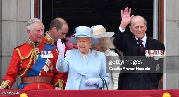 Prince Charles, Prince of Wales, Prince William, Duke of Cambridge, Queen Elizabeth ll and Prince Philip, Duke of Edinburgh look out from the balcony...