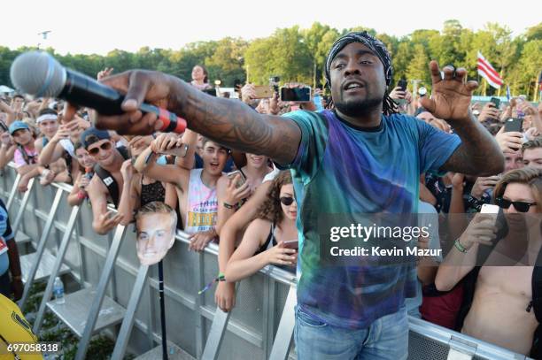 Rapper Wale performs from the crowd during the 2017 Firefly Music Festival on June 17, 2017 in Dover, Delaware.