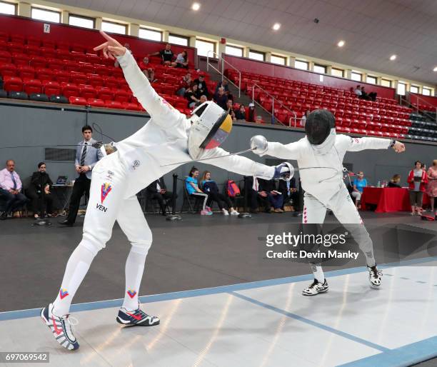 Hugues Boisvert-Simard of Canada fences Ruben Limardo Gascon of Venezuela during semi-final action in the Team Men's Epee event on June 17, 2017 at...
