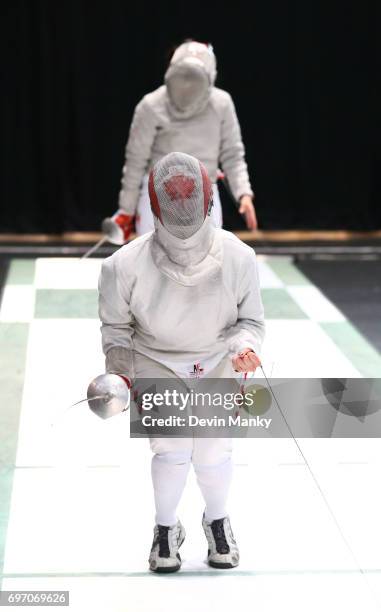 Madison Thurgood of Canada celebrates making a point against Julieta Toledo of Team Mexico during semi-final action in the Team Women's Sabre event...