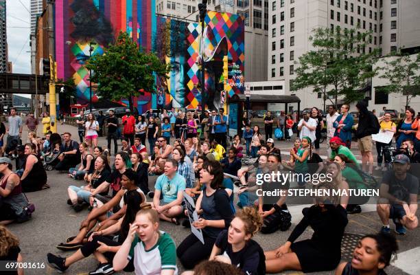 Protesters block an intersection on July 17, 2017 in Minneapolis, Minnesota. Demonstrations have taken place each day since a jury acquitted police...