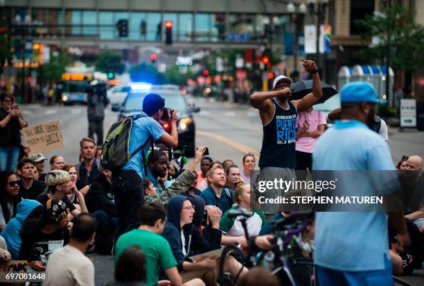 Protesters block an intersection on July 17, 2017 in Minneapolis, Minnesota. Demonstrations have taken place each day since a jury acquitted police...