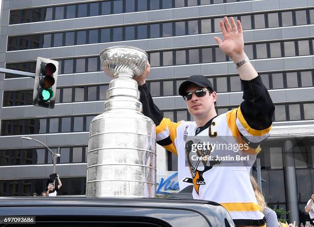 Sidney Crosby of the Pittsburgh Penguins waves to the crowd during the Victory Parade and Rally on June 14, 2017 in Pittsburgh, Pennsylvania.