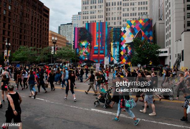 Protestors march down Hennepin Avenue on July 17, 2017 in Minneapolis, Minnesota. Demonstrations have taken place each day since a jury acquitted...