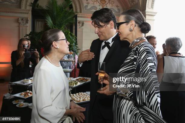 Monty Burnham, Rodrigo Basilicata, and Maryse Gaspard attend Pierre Cardin's 95th Birthday Celebration during the Pierre Cardin: 70 Years of...