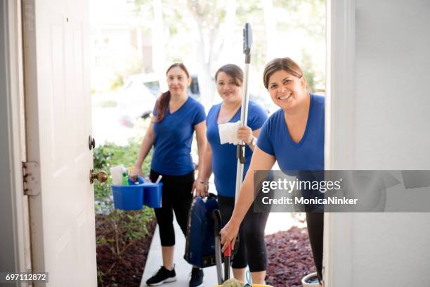 hispanic cleaning ladies - commercial cleaning stock pictures, royalty-free photos & images