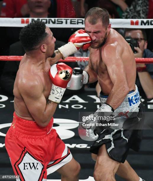 Andre Ward hits Sergey Kovalev with a left in the sixth round of their light heavyweight championship bout at the Mandalay Bay Events Center on June...