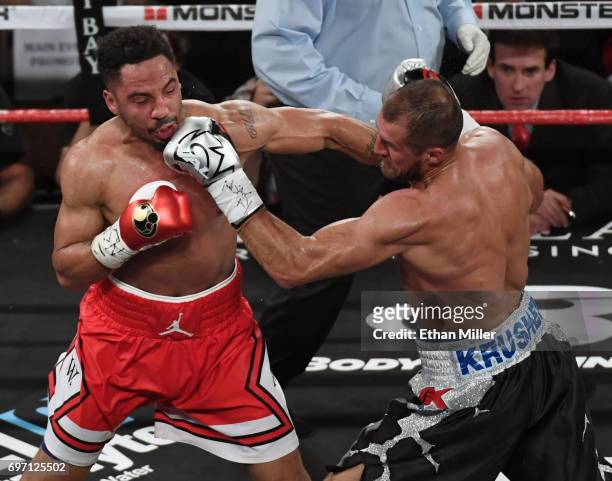 Andre Ward and Sergey Kovalev battle in the third round of their light heavyweight championship bout at the Mandalay Bay Events Center on June 17,...