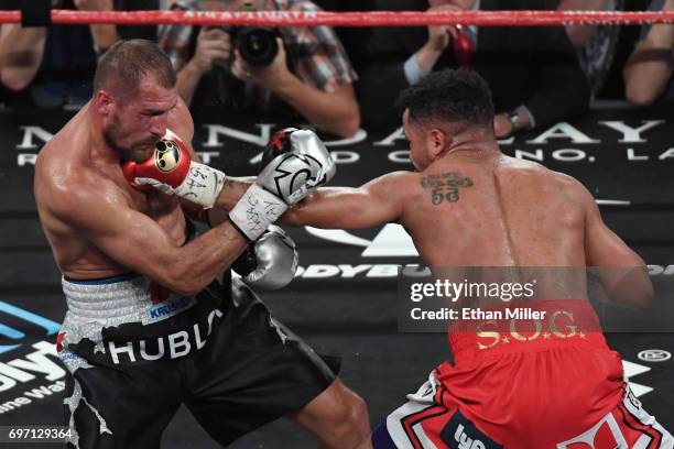 Andre Ward throws a left at Sergey Kovalev in the sixth round of their light heavyweight championship bout at the Mandalay Bay Events Center on June...