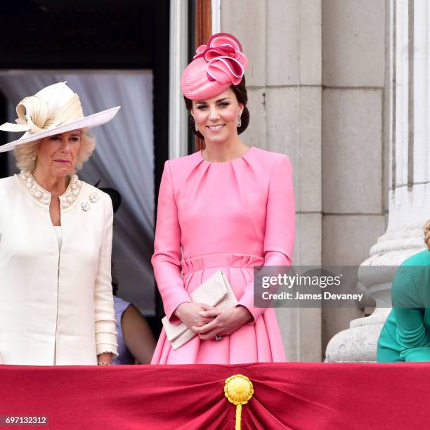 Camilla, Duchess of Cornwall and Catherine, Duchess of Cambridge stand on the balcony of Buckingham Palace during the Trooping the Colour parade on...