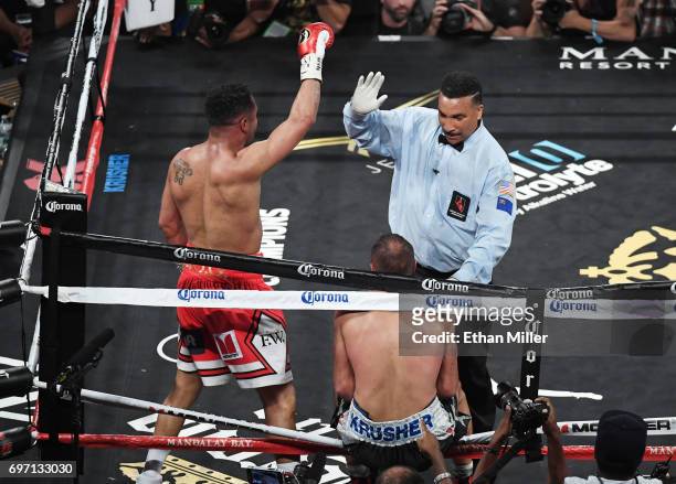 Andre Ward reacts as reacts as referee Tony Weeks stops his light heavyweight championship bout against Sergey Kovalev at the Mandalay Bay Events...
