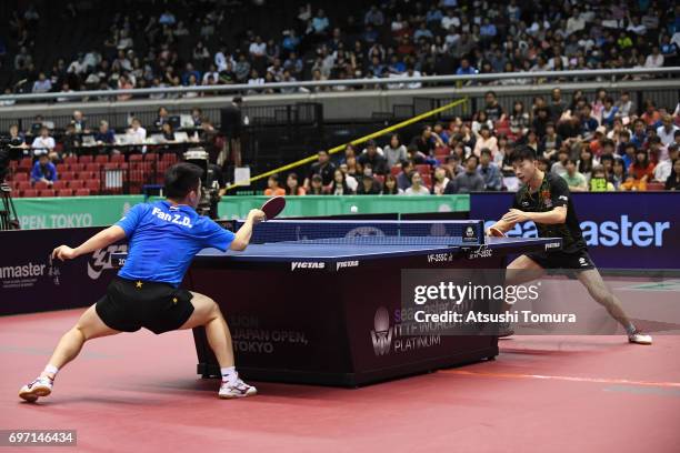 Zhendong Fan of China and Long Ma of China compete in the men's singles final match on the day 5 of the 2017 ITTF World Tour Platinum LION Japan Open...