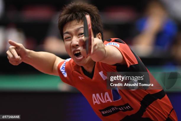 Jun Mizutani of Japan competes during the men's singles semi final match against Zhendong Fan of China on the day 5 of the 2017 ITTF World Tour...