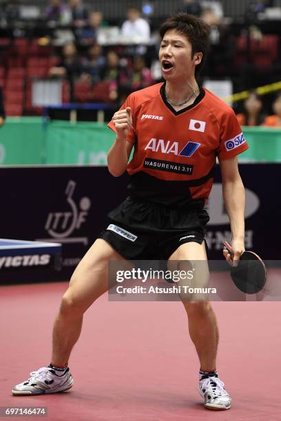 Jun Mizutani of Japan celebrates after a point during the men's singles semi final match against Zhendong Fan of China on the day 5 of the 2017 ITTF...