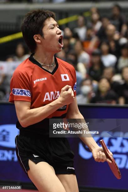 Jun Mizutani of Japan celebrates after a point during the men's singles semi final match against Zhendong Fan of China on the day 5 of the 2017 ITTF...