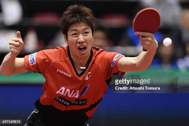 Jun Mizutani of Japan competes during the men's singles semi final match against Zhendong Fan of China on the day 5 of the 2017 ITTF World Tour...