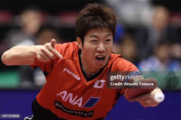 Jun Mizutani of Japan competes during the men's singles semi final match against Zhendong Fan of China on the day 5 of the 2017 ITTF World Tour...