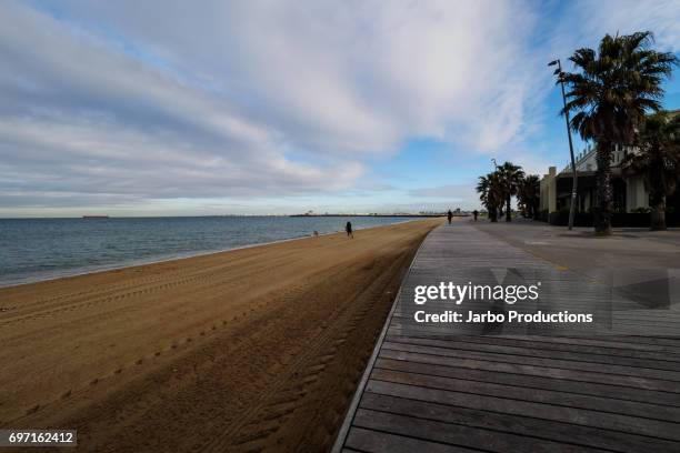 the boardwalk and beach front at st kilda melbourne - port phillip bay stock pictures, royalty-free photos & images