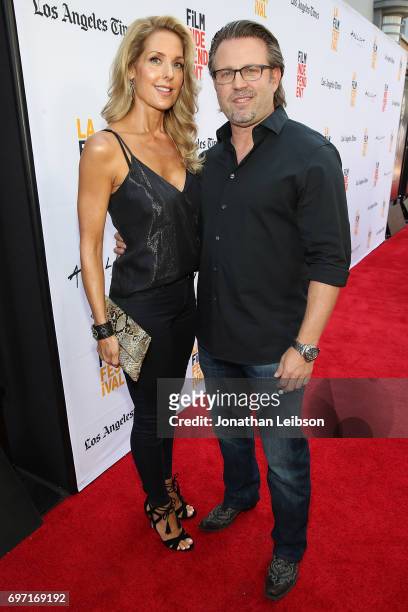 Tanya Lynn Waugh and Ric Roman Waugh attend theAT&T And Saban Films Present The LAFF Gala Premiere Of Shot Caller at ArcLight Cinemas on June 17,...