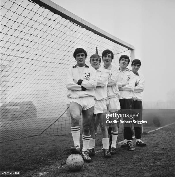 English pop rock group The Dave Clark Five in football gear, UK, 19th January 1964. From left to right, Dave Clark, Lenny Davidson, Mike Smith, Rick...