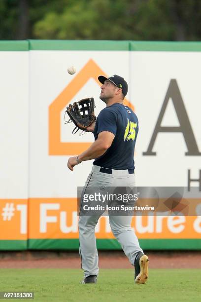 Tim Tebow of the Fireflies makes a catch during the minor league game between the Columbia Fireflies and the Charleston RiverDogs on June 17, 2017 at...