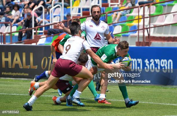 Alan Tynan of Ireland breaks free to scores a try in the first half during the World Rugby U20 Championship 9th Place Playoff match between Ireland...