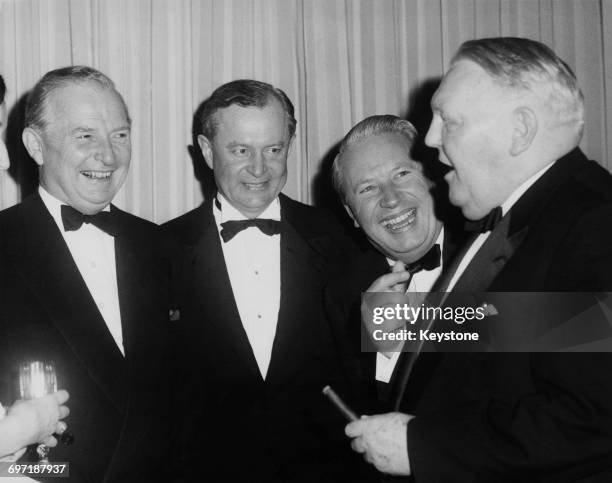 Ministers at a dinner given by the West German Ambassador at his embassy in London, 26th January 1962. Left to right: British Chancellor of the...