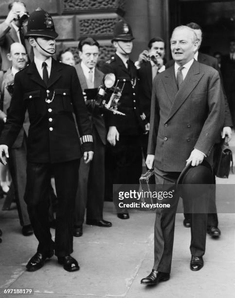 British Chancellor of the Exchequer Selwyn Lloyd leaving the Treasury to present his first budget at the House of Commons, 17th April 1961.