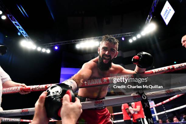 Jono Carroll celebrates after defeating Johnny Quigley for the Super Featherweight vacant IBF championship title as part of the Battle of Belfast...