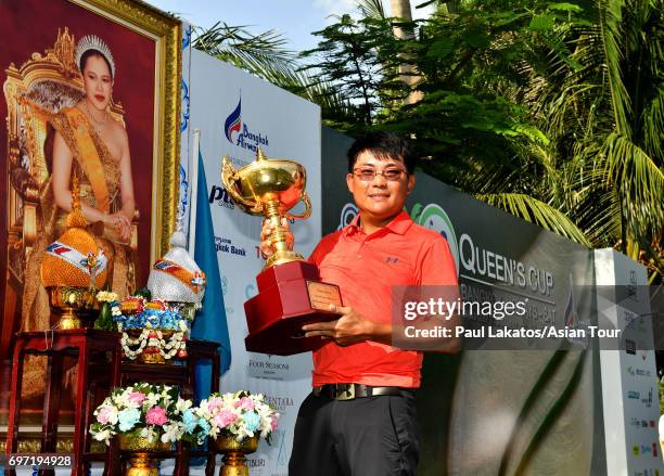 Nicholas Fung of Malaysia pictued with the winner's trophy during round four of the Queen's Cup at Santiburi Samui Country Club on June 18, 2017 in...