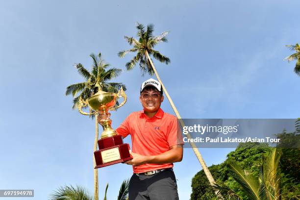 Nicholas Fung of Malaysia pictued with the winner's trophy during round four of the Queen's Cup at Santiburi Samui Country Club on June 18, 2017 in...