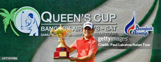 Nicholas Fung of Malaysia pictued with the winner's trophy during round four of the Queen's Cup at Santiburi Samui Country Club on June 18, 2017 in...