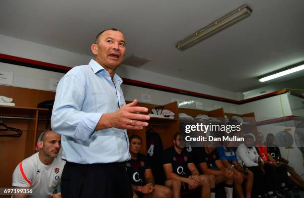 Eddie Jones, Head Coach of England speaks to his players in the changing room following their victory during the ICBC Cup match between Argentina and...