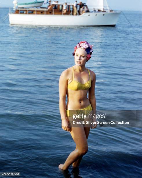 German actress Elke Sommer in a yellow bikini, circa 1970.