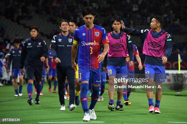 Masato Morishige and FC Tokyo players show dejection after the 0-1 defeat in the J.League J1 match between FC Tokyo and Yokohama F.Marinos at...