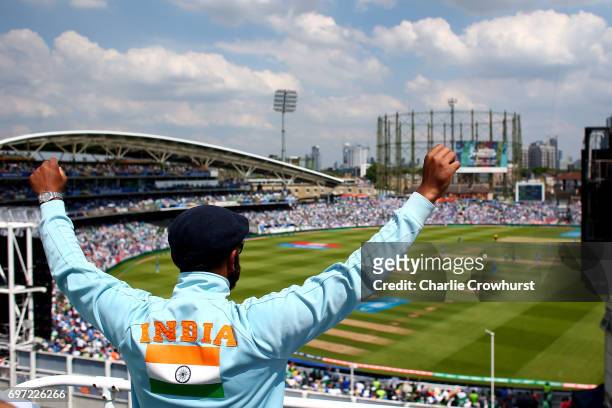An India fan watches from a near by roof during the ICC Champions Trophy Final match between India and Pakistan at The Kia Oval on June 18, 2017 in...