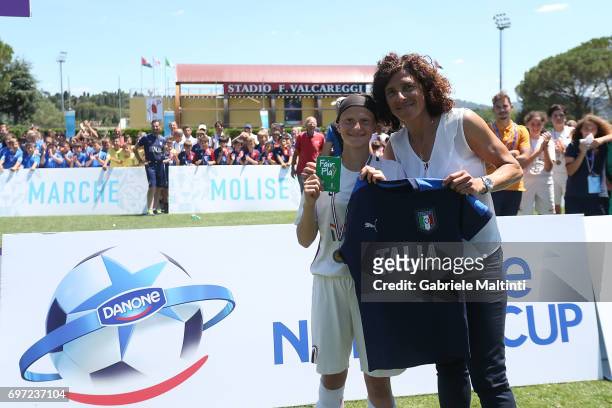 Sara Pezzi of AS Roma wins Green Card Fair Play and is rewarded by Rita Guarino manager of Italy Under 17 during the Danone Cup final at Coverciano...