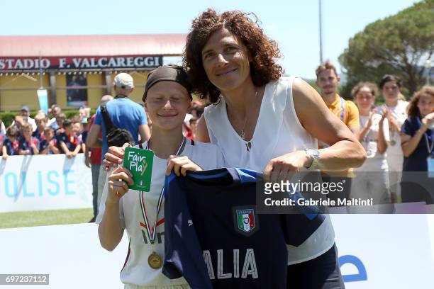 Sara Pezzi of AS Roma wins Green Card Fair Play and is rewarded by Rita Guarino manager of Italy Under 17 during the Danone Cup final at Coverciano...