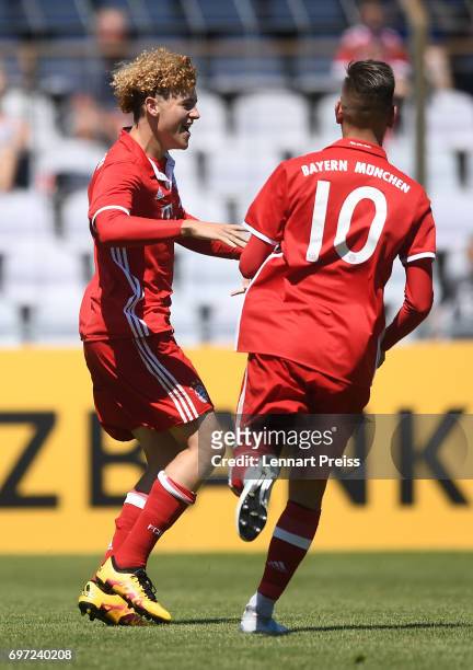 Benedict Hollerbach and Marcel Zylla of FC Bayern Muenchen celebrate scoring their side's second goal during the B Juniors German Championship Final...