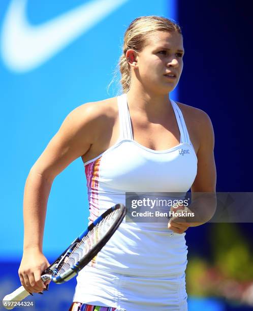 Jana Fett of Croatia celebrates winning a point during the qualifying match against Fanny Stollar of Hungary on day two of qualifying for the Aegon...