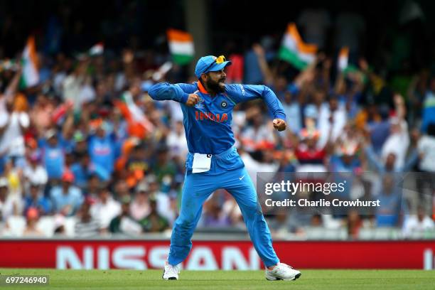 Virat Kohli of India celebrates a wicket during the ICC Champions Trophy Final match between India and Pakistan at The Kia Oval on June 18, 2017 in...